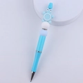 Detail of blue ballpoint pen with cartoon turtle bead and sparkling rhinestone ring - Blue Turtle