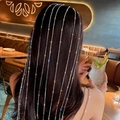 Elegant silver tassel headband with long sparkling rhinestone chains in a waterfall design - Silver Tassel Style