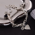 Vintage silver chain bracelet featuring cross heart pendant and black gemstone detail - Lock & Heart Black Gem Style (SL0149)