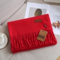 Deep red solid color cashmere-feel scarf with elegant fringes and premium brand leather tag - Red