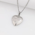 Silver heart locket necklace with dual heart engraving on a polished stainless steel finish - Double Heart/Steel