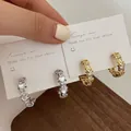 Elegant gold and silver hoop earrings with hollow heart design and sparkling crystals - Silver Heart Zirconia C-Shape Stud Earrings (A-140)