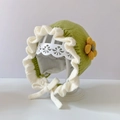 Green knit baby hat with ear flaps, white lace trim and yellow flower detail - Emerald Green White Edge Flower - Lined