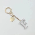 Golden heart keychain with white rhinestone letter F and engraved message pendant - Letter F