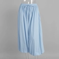 Close-up of light blue cotton lantern pants featuring elastic waist and drawstring detail - S / Sky Blue