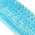 Detailed macro view of blue cat-eye stone loose beads for DIY jewelry making material - 4mm (Approx 90pcs) / Lake Blue