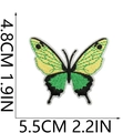 Close-up of butterfly embroidery patch showing high-density green and yellow stitching - Colorful Butterfly