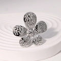 Minimalist silver flower ring with hammered petal texture and unique beaded center - Steel