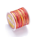 Macro detail of multicolored 72# gradient jade cord for DIY jewelry weaving and beading - Color No. 3