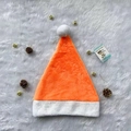 Vibrant orange plush Christmas hat with white faux fur trim and gold bells - Orange Plush Hat