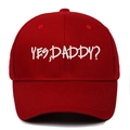 Close-up of white YES DADDY embroidery on a deep red cotton baseball cap detail - Adjustable / Burgundy