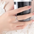 Adjustable silver barbed wire ring featuring a bold bow-shaped wrap design for women - US 6 / Steel