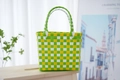 Handwoven plastic basket with yellow, green, and white checkered pattern and dual handles - Plain Plaid / Green Yellow White