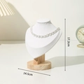 White fabric necklace bust display with a solid wood base measuring 17.2cm by 14.5cm - Small Size White Leather