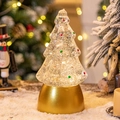 Light-up Christmas tree snow globe on a gold base with warm white LED lighting - Gold Base Christmas Tree