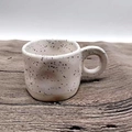 Minimalist ceramic mug with black ink splatter pattern and thick ring handle on wooden desk - 250ML / Off White