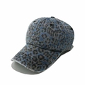Close-up of washed denim baseball cap with leopard print and vintage blue gray texture - M (56-58cm) / Blue