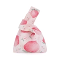 Detail of knot wrist bag featuring pink peach watercolor print on cream cotton fabric - Peach