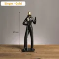Scultura cantante moderna nera e oro con finitura opaca per decoro casa - Cantante (Oro)