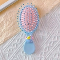Light blue air cushion hairbrush featuring a cute cartoon star and pink bristles - Blue Star (Long Comb)