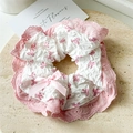 Lace scrunchie with pink bow patterns and ruffle edges on a decorative plate - Pink Bowknot