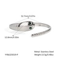 Detailed view of silver snake bangle with green stone eyes and spiral scale texture - Silver Style(YYBL025019-P)