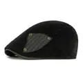 Black corduroy flat cap featuring vintage side patches and metallic rivet details - Adjustable / Black
