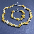 Irregular yellow and white natural stone necklace and bracelet set on blue background - Bracelet / Topaz
