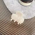 Minimalist ivory acetate hair claw clip with elegant marble texture and five-tooth grip - Gem White