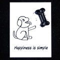 Black bone-shaped crystal fridge magnet on a cute dog card with happiness quote - Obsidian