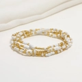 Detail of double-layered beaded waist chain with yellow and white glass seed beads - 80cm / White/Yellow Gold