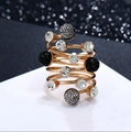 Golden multi-layer spiral ring featuring white crystals and dark grey decorative beads - 5-Layer Spiral Rhinestone Ball