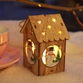 Lighted wooden Christmas house ornament featuring a snowman and cutout star - Colored Snowman Style