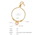 Golden titanium steel bracelet featuring a heart-shaped shell pendant and crystal accents - Gold White Seashell Bracelet (E465)