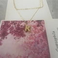 Double-layer gold necklace with crystal-encrusted letter K pendant and paperclip chain - Letter K