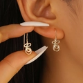 Minimalist gold spiral hoop earrings with elegant geometric curved design for women - Abstract Curve Style (6495) / Gold