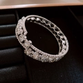 Macro shot of silver plated bangle with dense rhinestones on a black velvet box - 19# 3-Layer Silver Flower Bangle