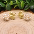 Golden bee stud earrings with cluster white pearls on a natural wood surface - White Flower Ball Bee Style 5