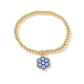 Detailansicht eines 18K vergoldeten Perlenarmband mit blauem Auge Blumenanhänger - Gold-Hellblaues Teufelsauge