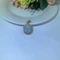 Pendentif ovale élégant en or avec pierre bleu clair et halo de zircons blancs - Pendentif Seul (Sans Chaîne) / Ovale Bleu Glace