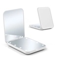 Macro view of portable LED makeup mirror showing foldable white plastic casing and light - White