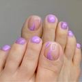 Purple press-on toenails featuring solid color, glitter, and ripple pattern styles - 1635-Purple Wave