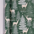 Dark green Christmas wrapping paper roll with reindeer, trees and Merry Christmas text - Elk
