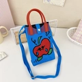 Detail of blue knitted crossbody bag featuring a red apple pattern and metal snap button - 14-Blue Red Apple