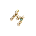 Macro detail of gold letter M pendant featuring white and blue pearls for necklaces - Pearl Letter M - Blue
