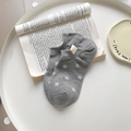 Grey cotton invisible boat socks featuring white star patterns and yellow heel label - One Size / Light Gray