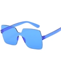 Modern oversized rimless square sunglasses in a vibrant transparent candy blue finish - Dark Blue