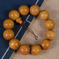 Authentisches Holzperlen-Armband mit großen polierten braunen Perlen und Kürbis-Anhänger - 20mm*12 Perlen/Feines Loch Stil