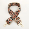 Dettaglio della tracolla larga etnica jacquard con motivi floreali e fibbie in metallo oro - Marrone Blu Profondo / Fibbia Oro