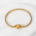 Classic 3mm golden snake chain bracelet featuring a polished heart-shaped clasp - Gold Heart Buckle